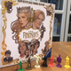 The box cover art and miniatures for The Princess Bride: Adventure Book Game.